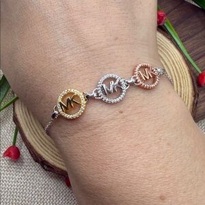 Michael Kors Silver and Gold Logo bracelet